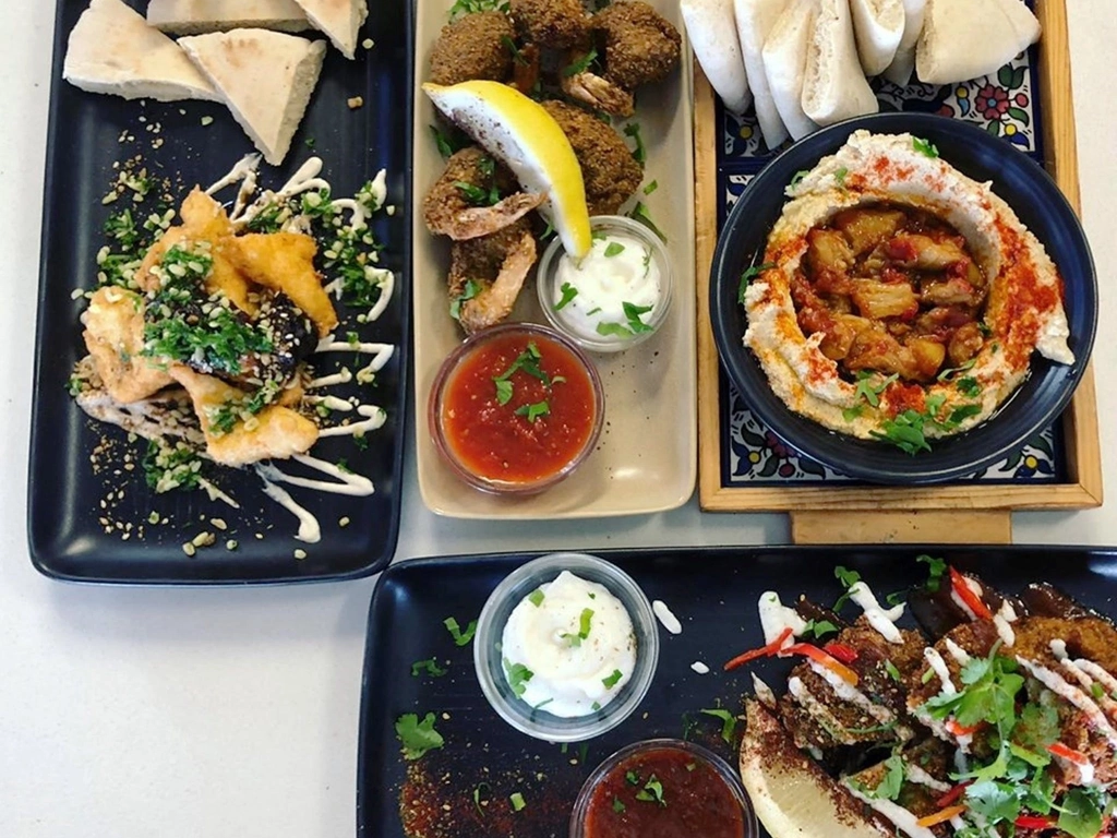 Falafel Prawns, Dukah Halumi Cheese, Hummus w/Spicy Eggplant, Falafel Chicken Schnitzle