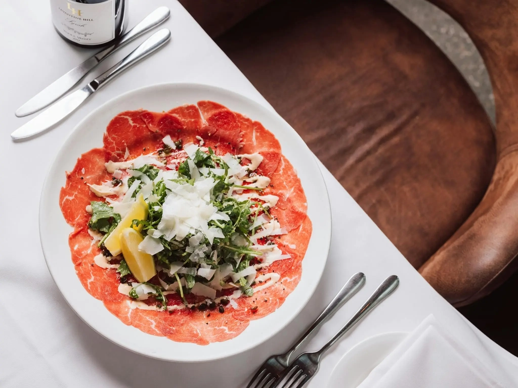 Beef Carpaccio italian dish at restaurant