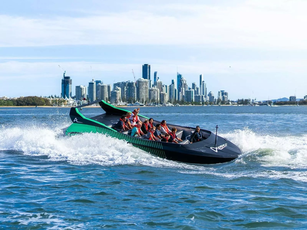 Arro Jet Boat in front of Surfers Paradise skyline.