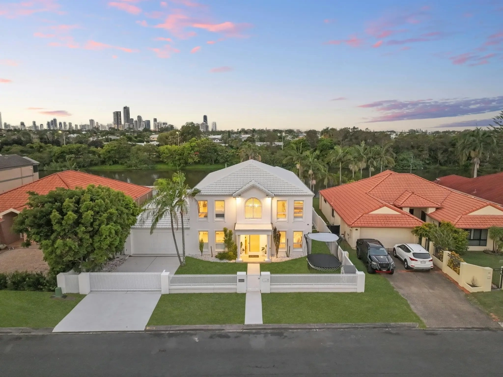 Twilight aerial of the home with the Surfers Paradise skyline beyond