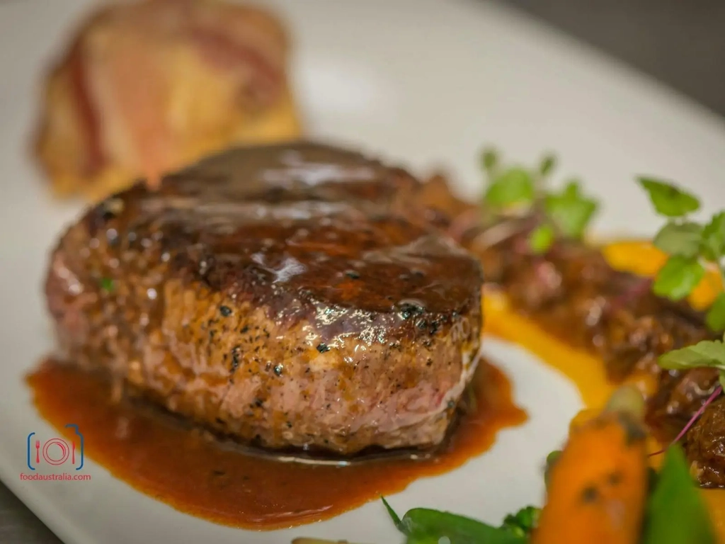 Beef on plate with sauce