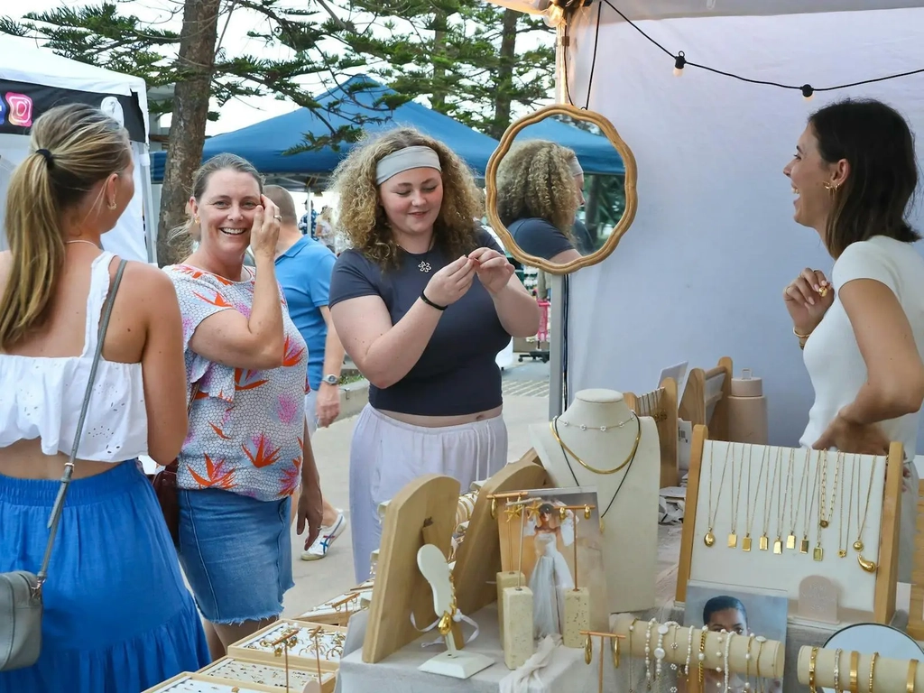 Trying on jewellery at Surfer's Paradise Markets