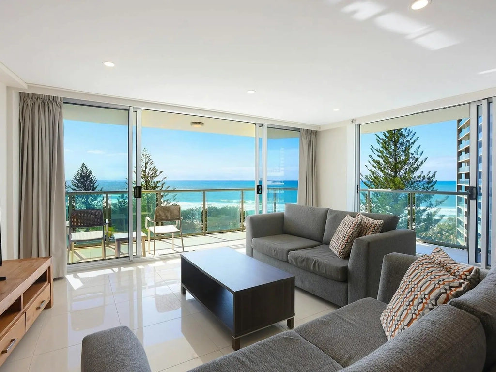Lounge room with smart TV, Balcony wit direct ocean views Surfers Paradise Gold Coast Holidays