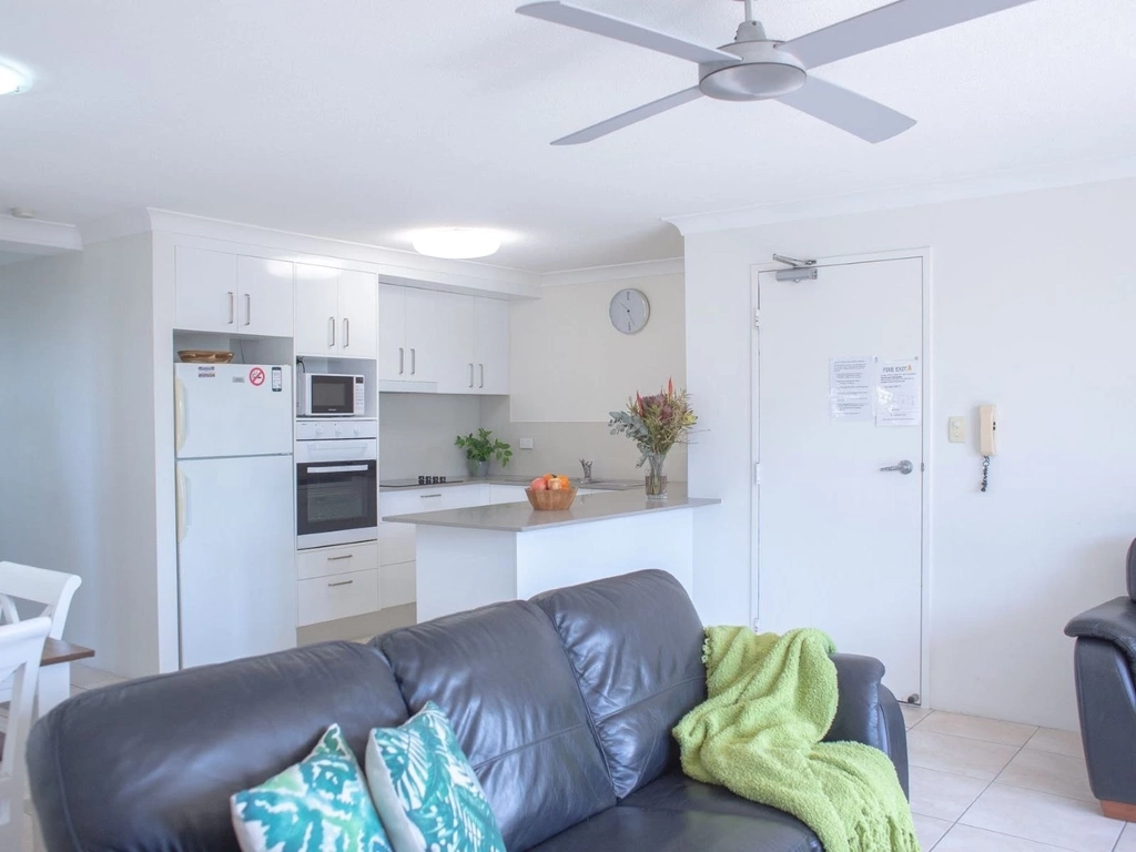 Kitchen, dining, living area.