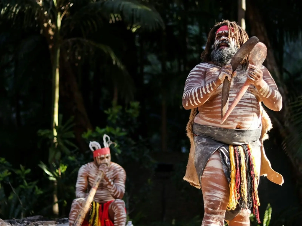 Two, male, First Nations Australians presenting cultural show at Currumbin Wildliufe Sanctuary