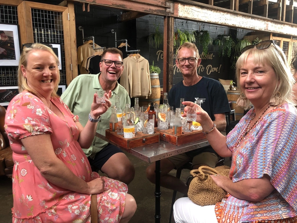 All smiles at a local gin distillery
