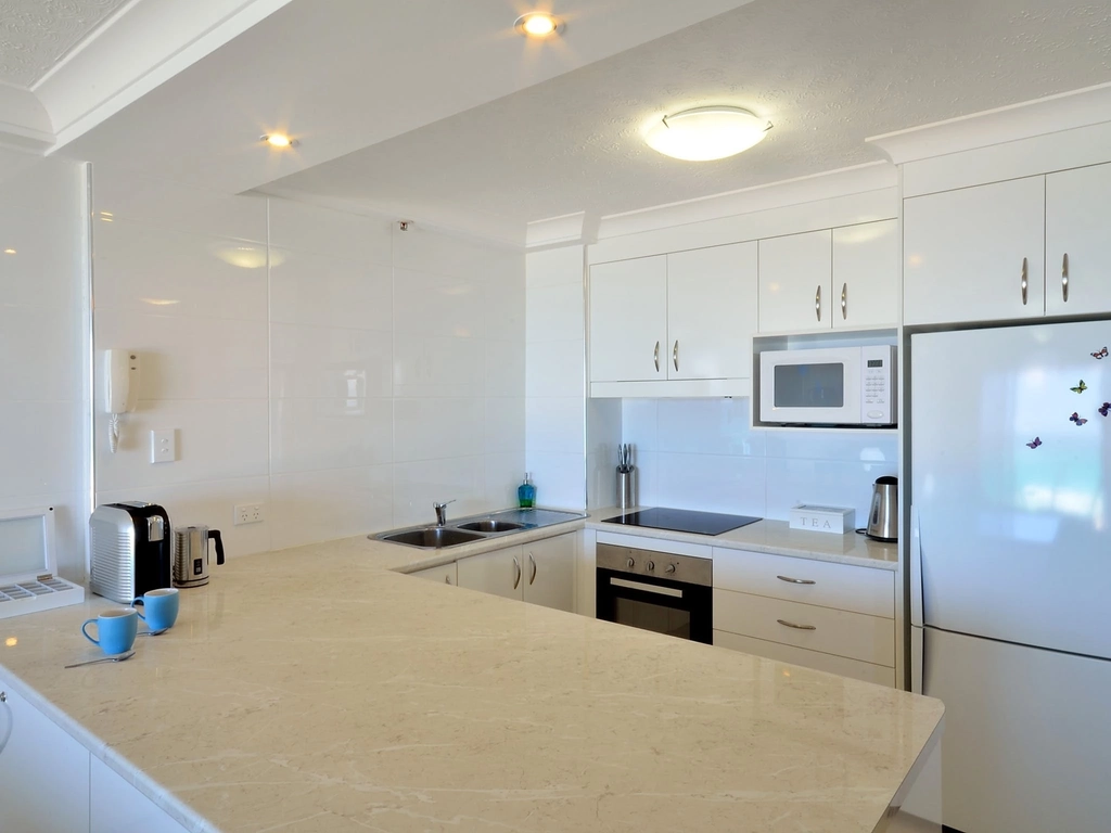 modern renovated kitchen with open plan  bench with ocean views