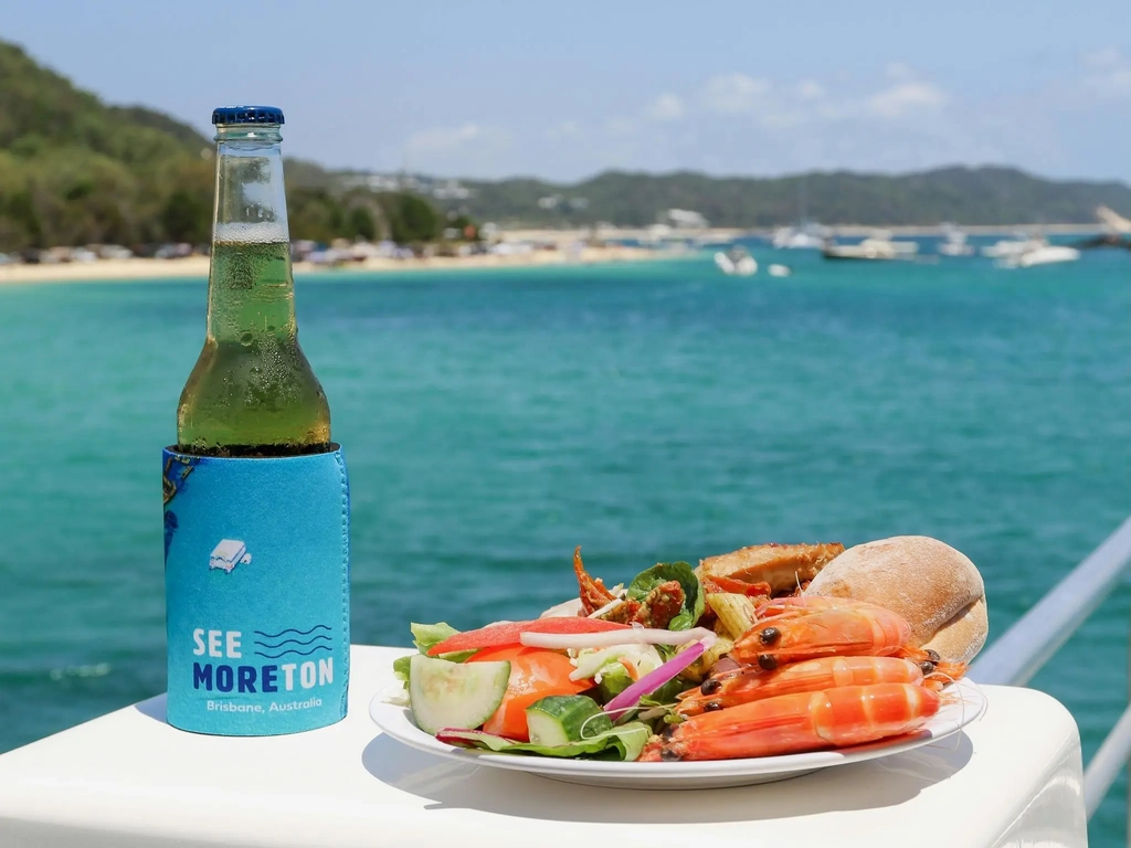 Buffet Lunch on plate and ice-cold beverage at Moreton Island (Mulgumpin)