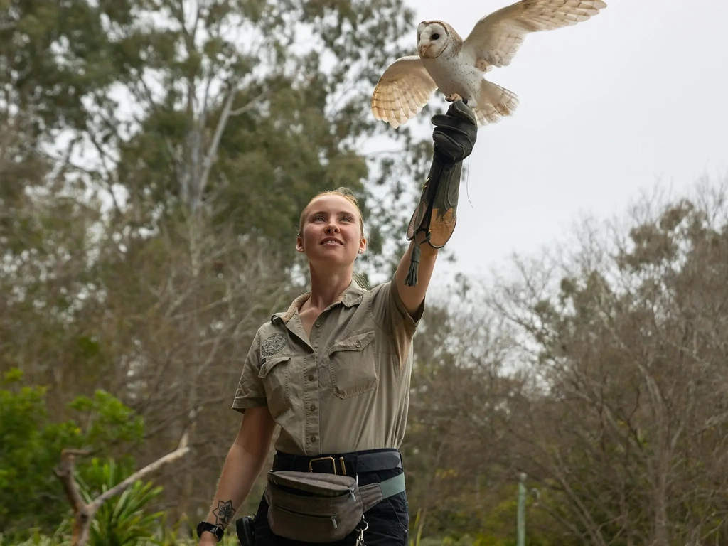 Wildlife keeper with owl