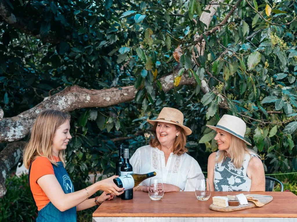 Guests enjoying personalised wine tasting with dedicated host