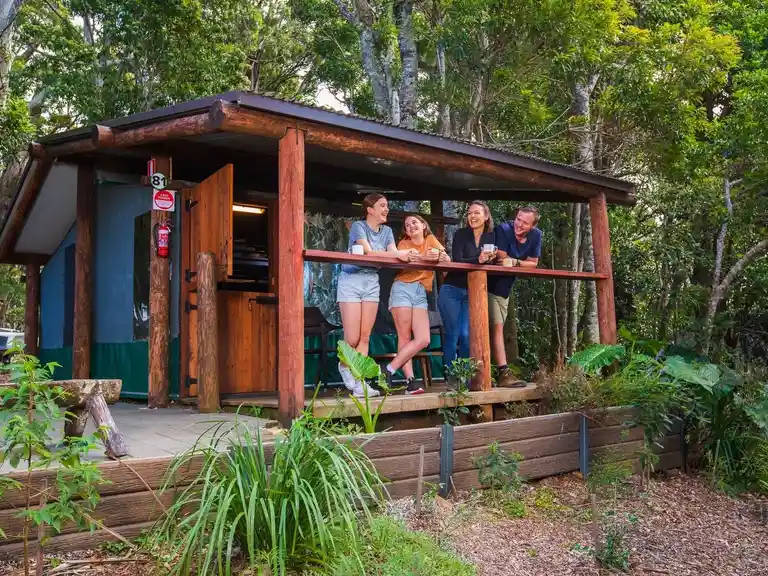 family at a safari tent
