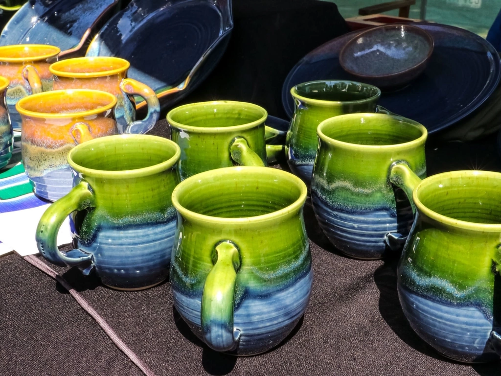 colourful handmade Mugs with blue and green glaze