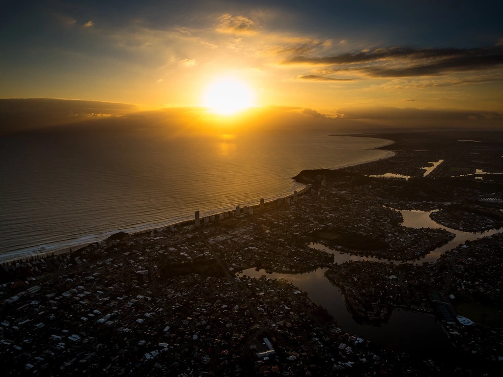 The spectacular view of a coastal balloon sunrise over the Gold Coast