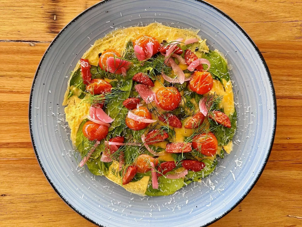 Chorizo omelette, dill, spinach, tomatoes, pickles, parmesan.