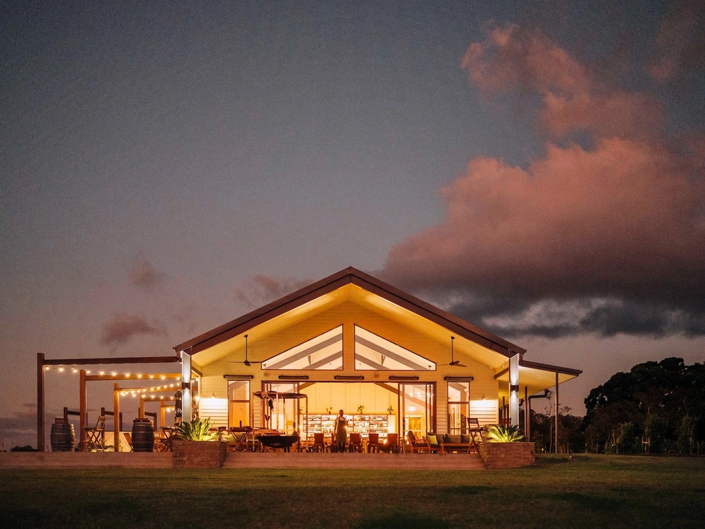 The Paddock restaurant exterior at sunset, Hazelwood Estate