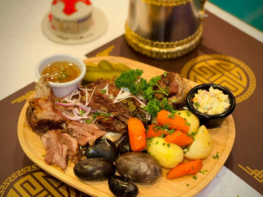 Traditional Mongolian Khorkhog dish cooked with hot stones