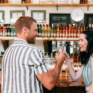 Couple tasting in front of main bar