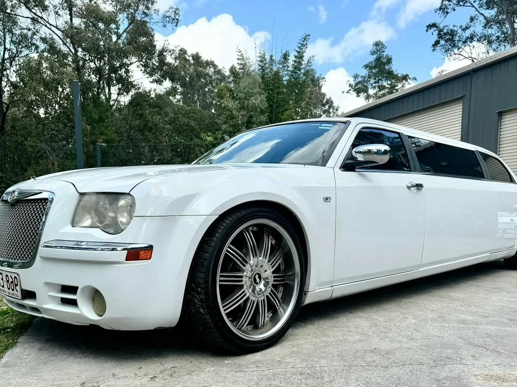 White Chysler stretch limousine