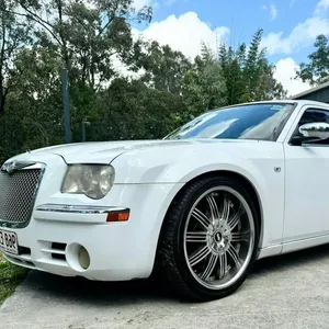 White Chysler stretch limousine