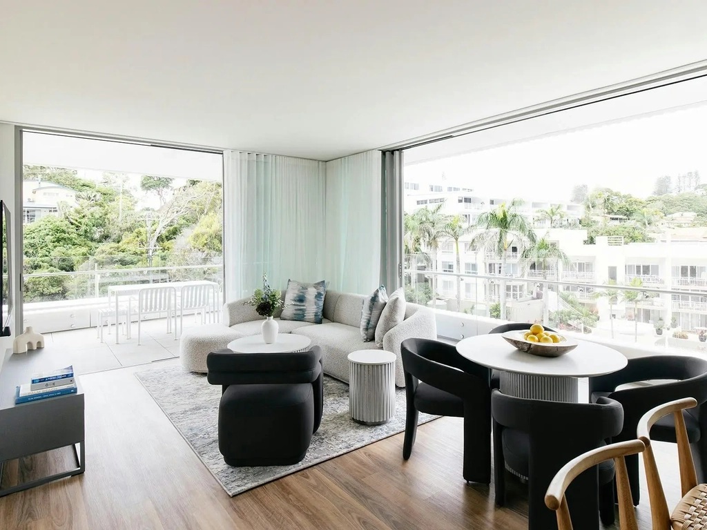 Light-filled Kirra Point apartment with balcony, lush views, and stylish coastal interiors.