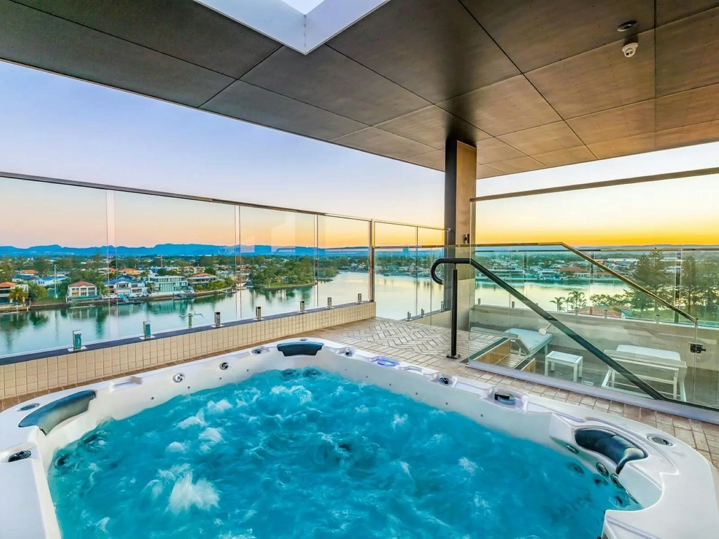 Relax in the Rooftop Spa with River and city views